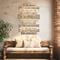 Family wall hanging in an entryway. The boards are attached with a staggared edge. Each has a phrase drawn in different decorative writing. 